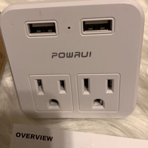 Set of two international power adapters. Instruction manual included